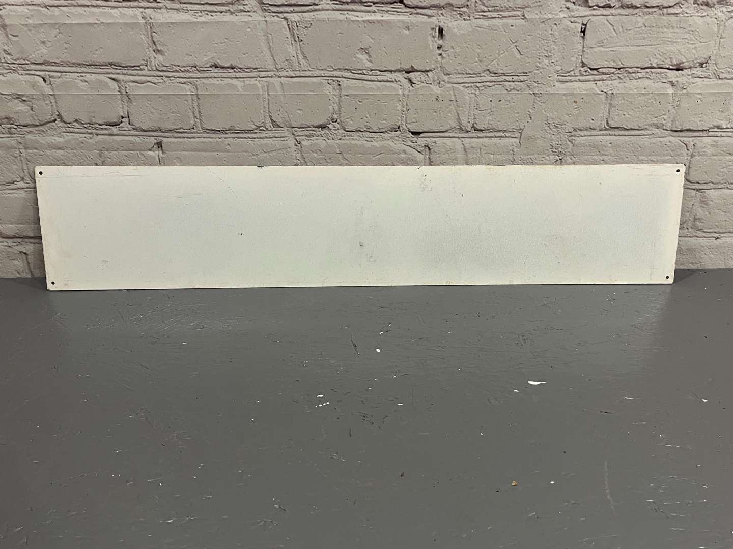 <p>Michelin Metal Running Man Sign</p>