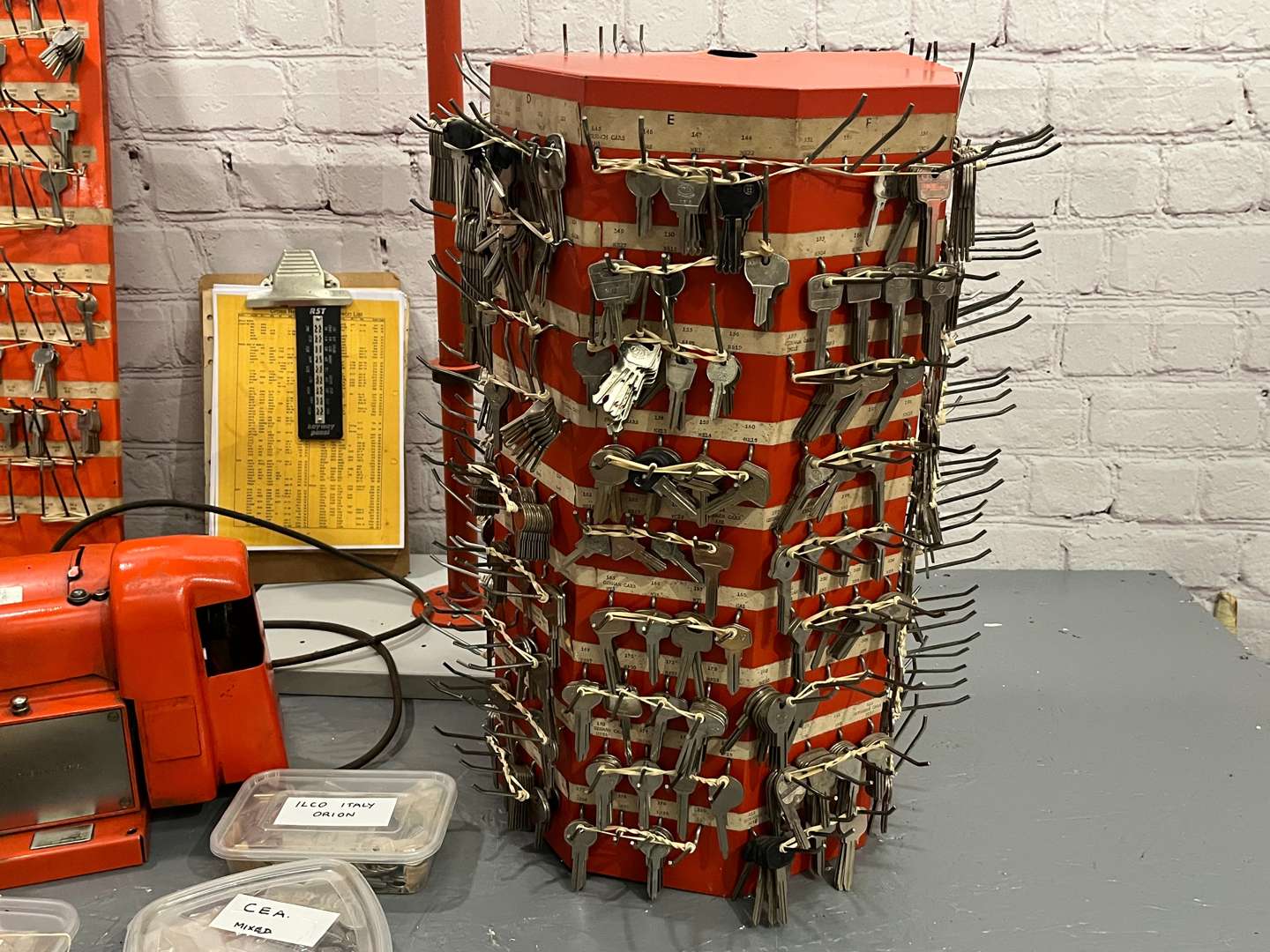 <p>Key Cutting Machine, Stand and a Large Quantity of Blanks&nbsp;</p>