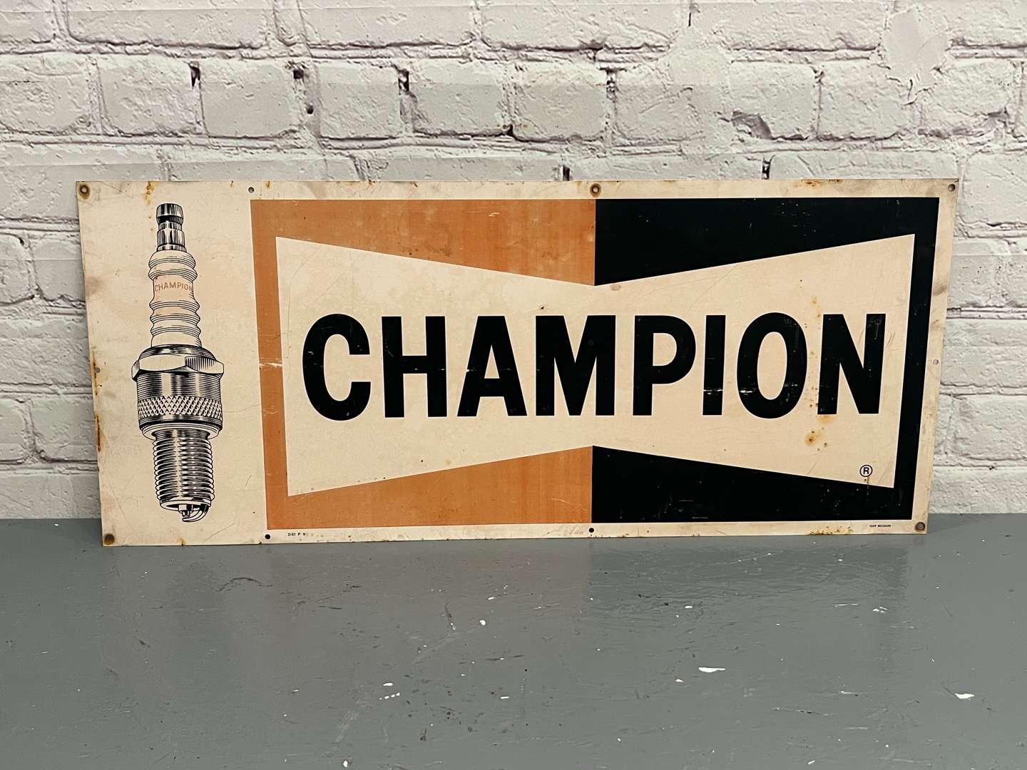 <p>Champion Plastic Spark Plug Sign</p>