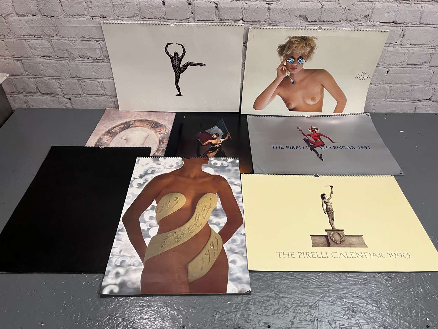 <p>Eight Pirelli Calendars&nbsp;</p>