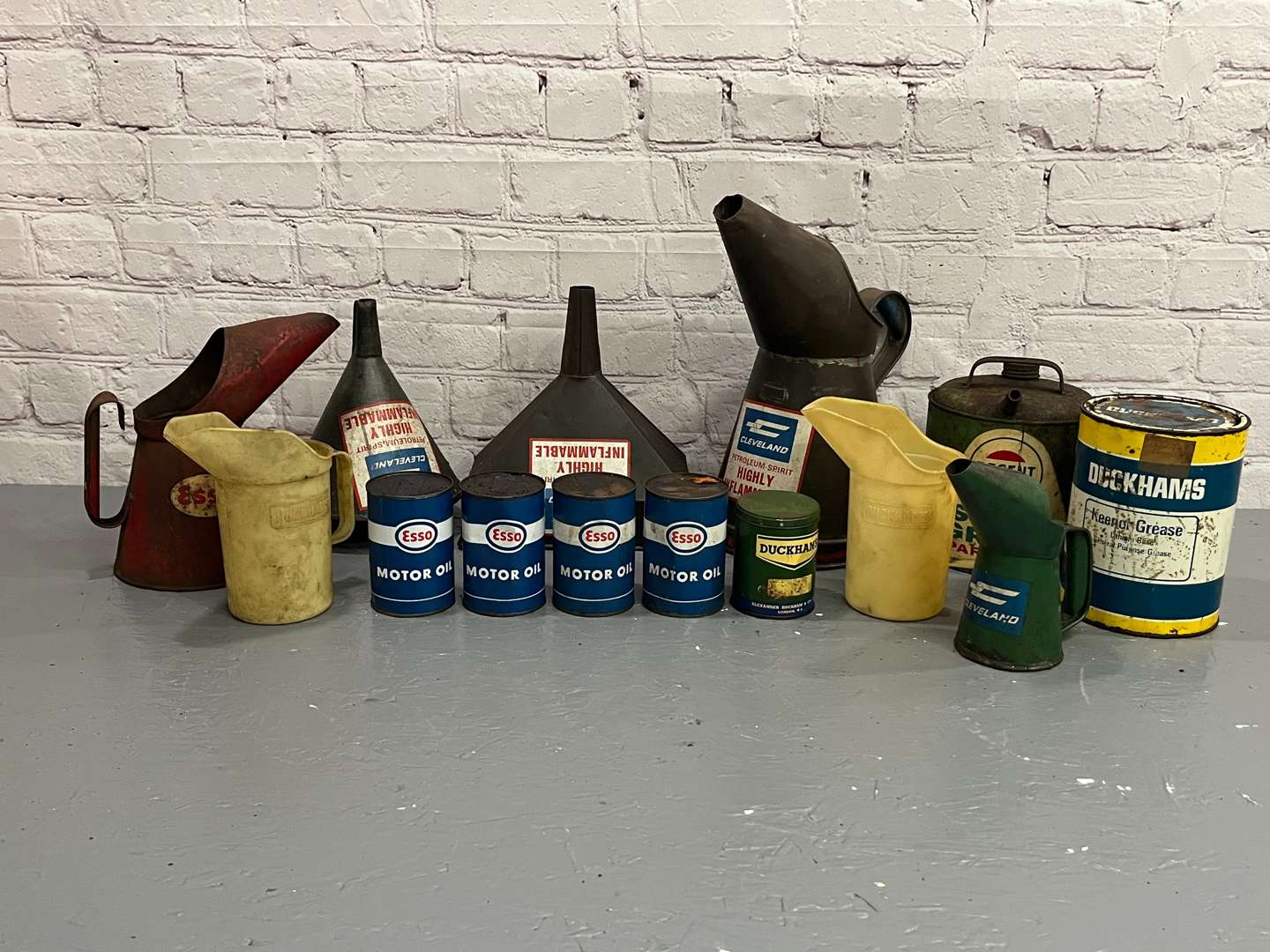 <p>Quantity Cleveland, Duckhams and Esso Oil Cans/Pourers</p>