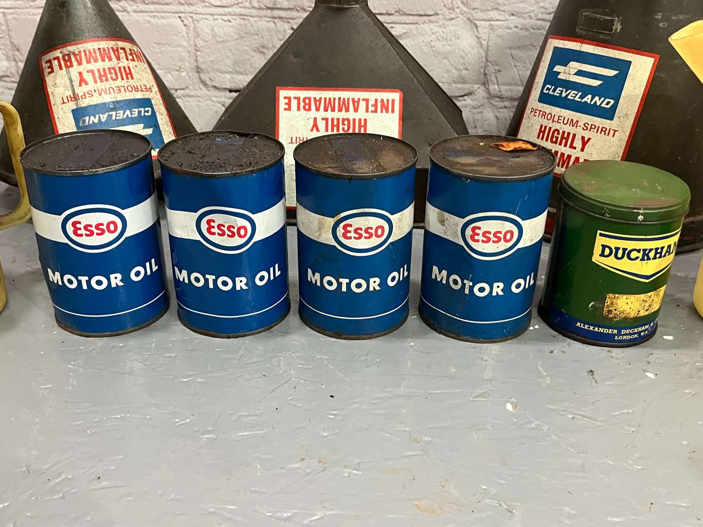 <p>Quantity Cleveland, Duckhams and Esso Oil Cans/Pourers</p>