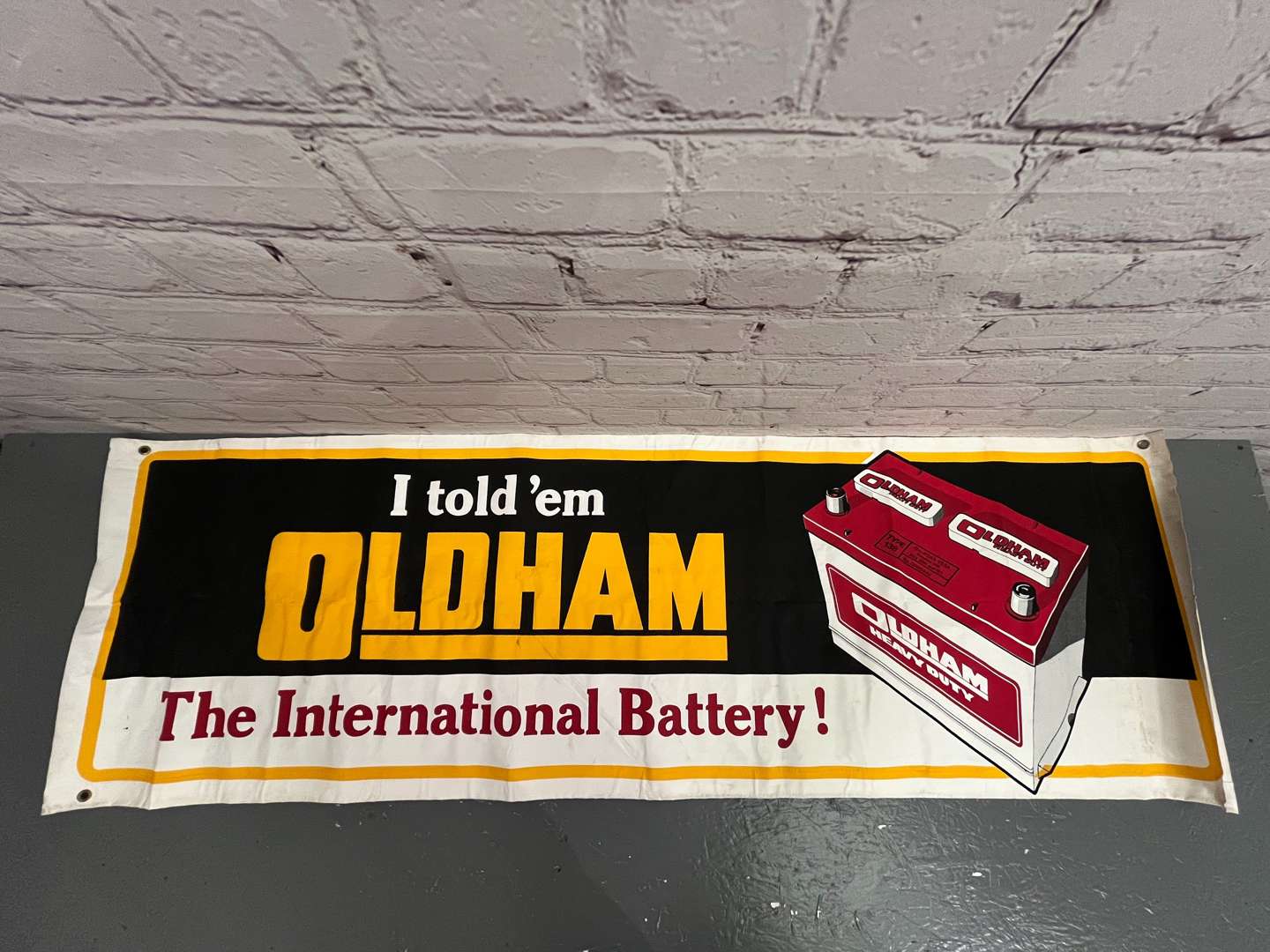 <p>Original Oldham “I Told' Em” Batteries Banner 175 x 55cm</p>