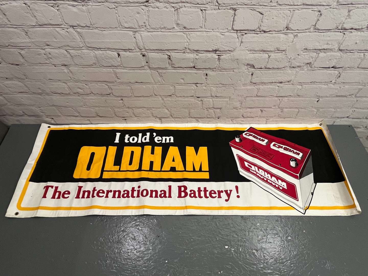 <p>Original Oldham “I Told' Em” Batteries Banner 175 x 55cm</p>