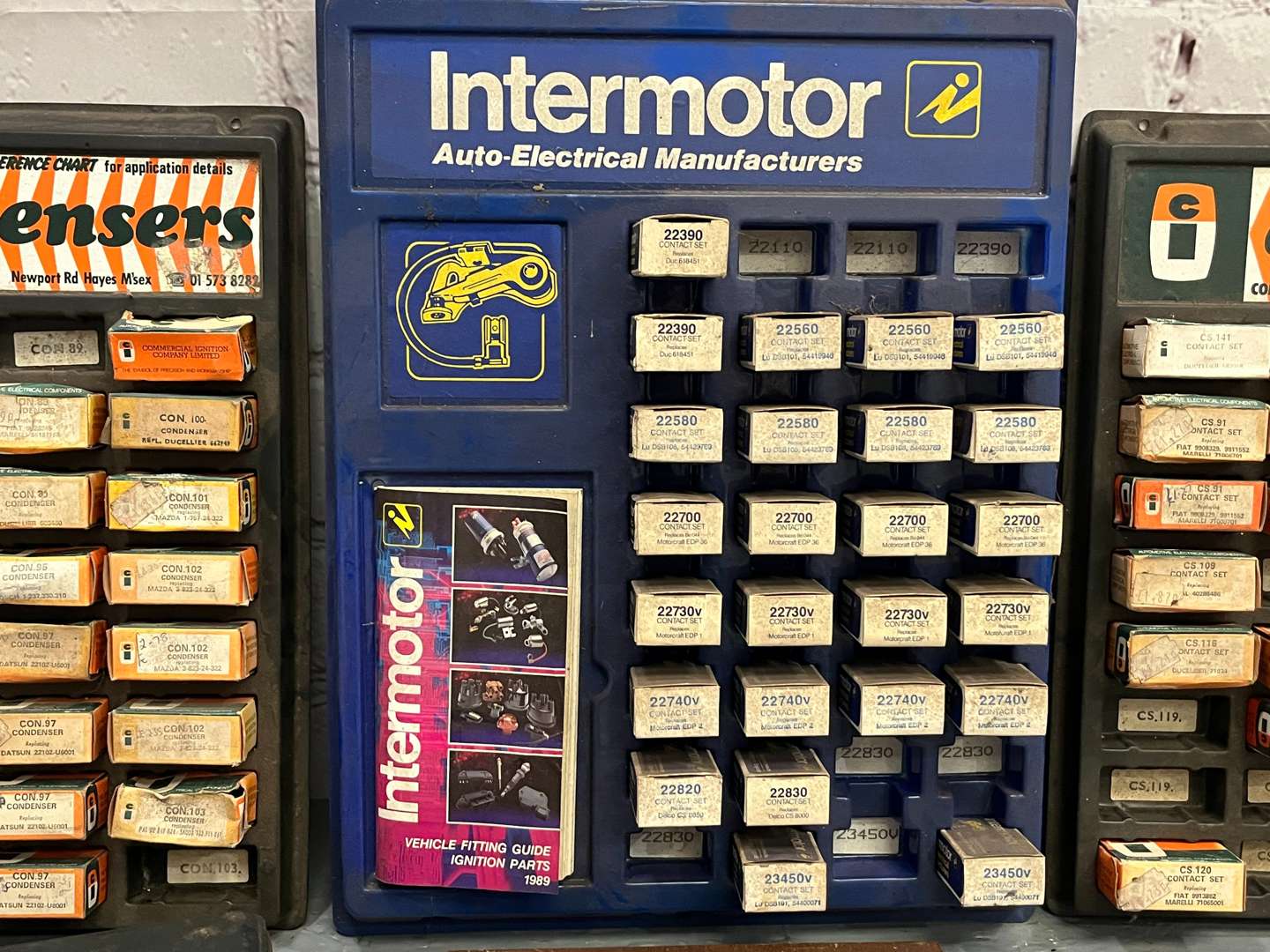 <p>Three Workshop Contact Sets and Condensers Display Service Award</p>