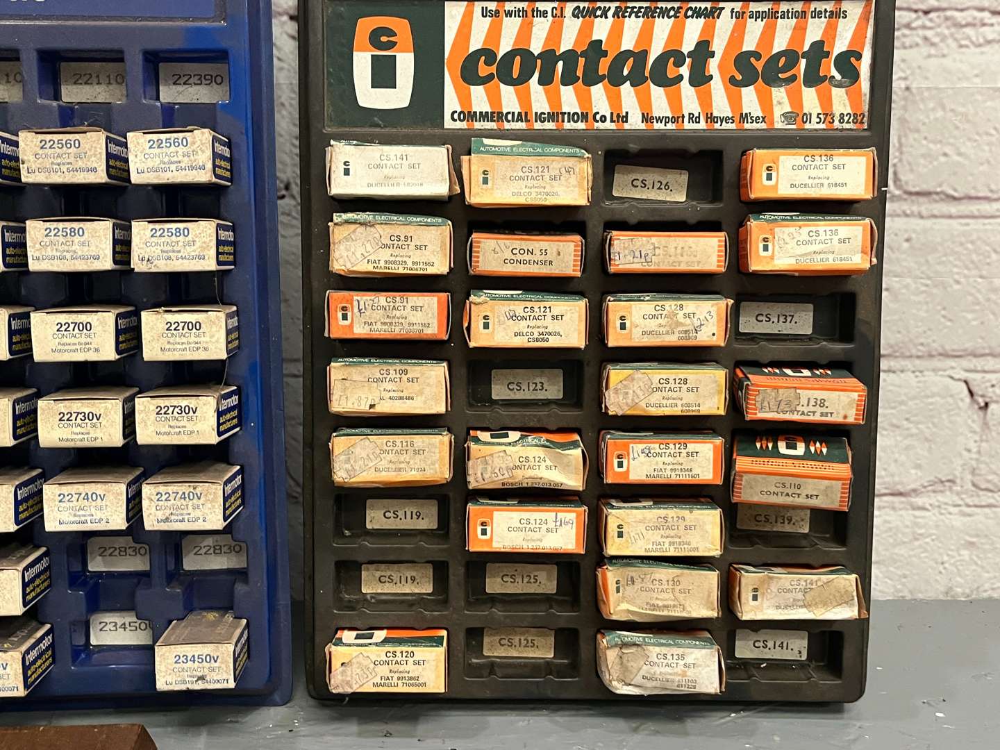 <p>Three Workshop Contact Sets and Condensers Display Service Award</p>