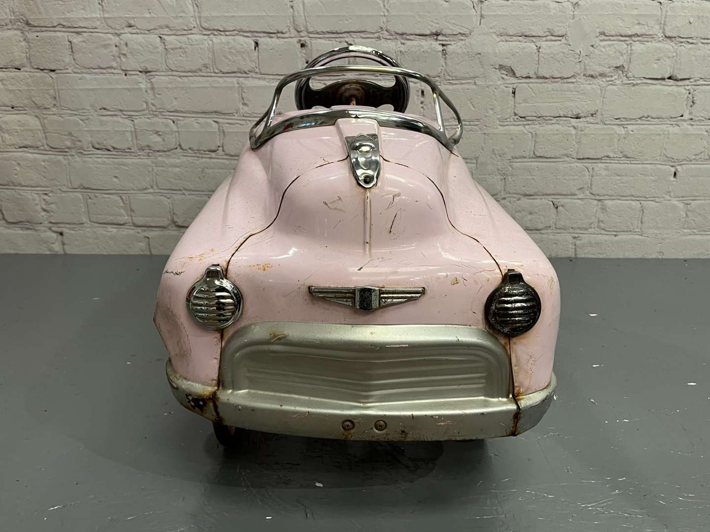 <p>Pink 1950's Styled Childs Pedal Car</p>