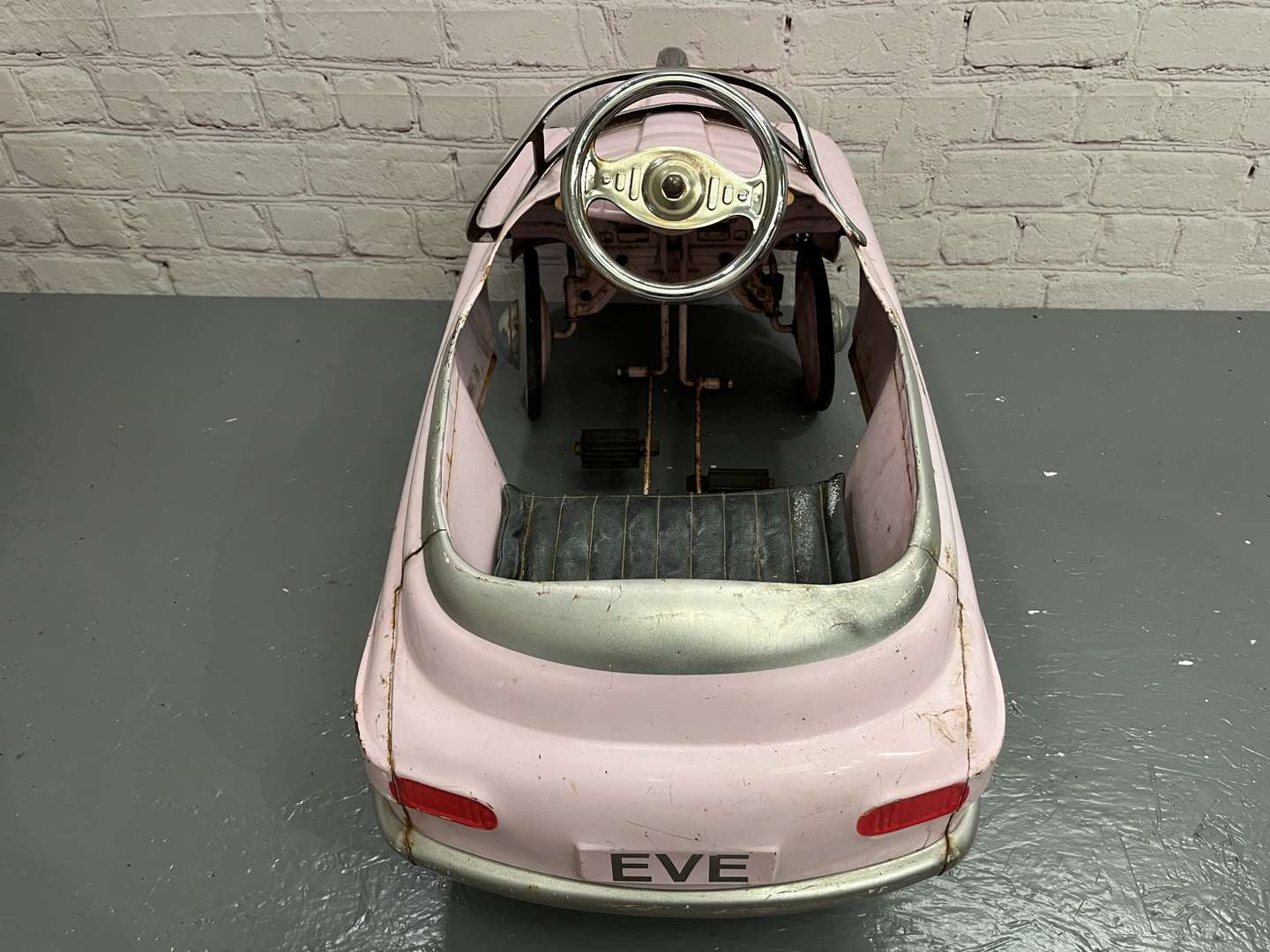<p>Pink 1950's Styled Childs Pedal Car</p>