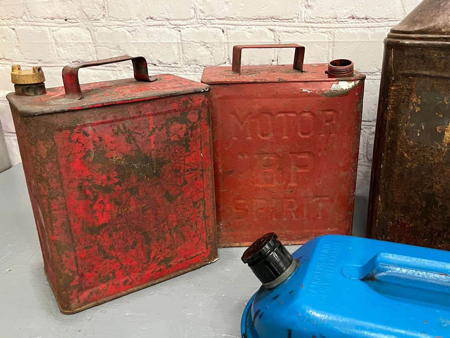 <p>Seven Assorted Fuel Cans</p>