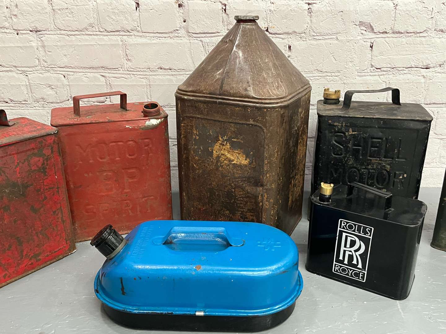 <p>Seven Assorted Fuel Cans</p>