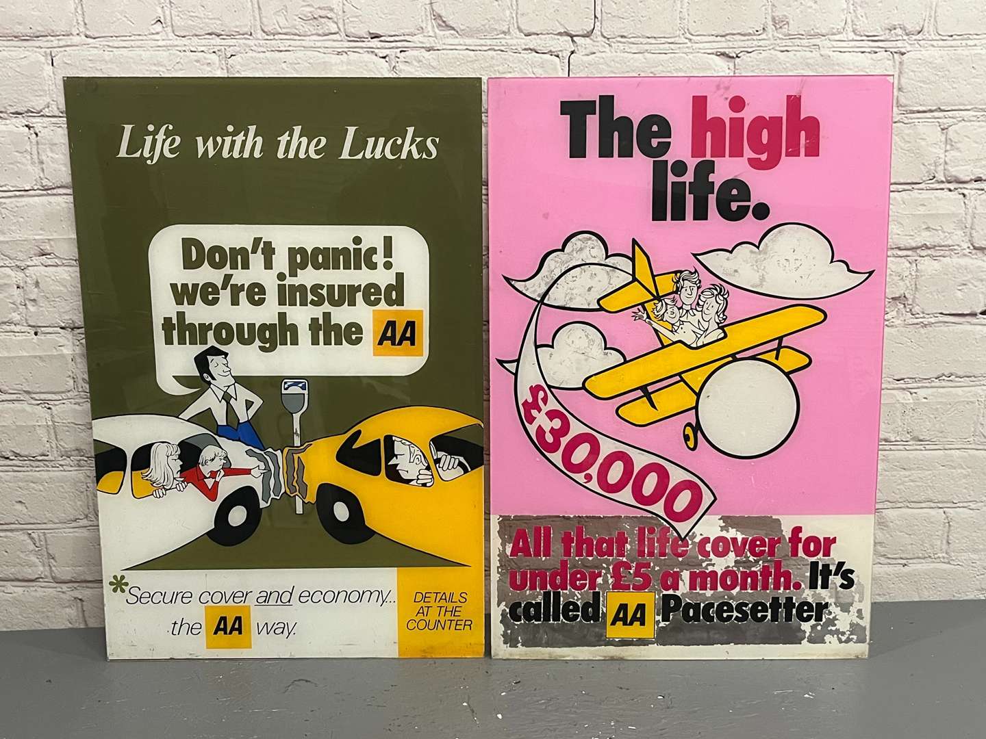 <p>Two Perspex AA Signs</p>