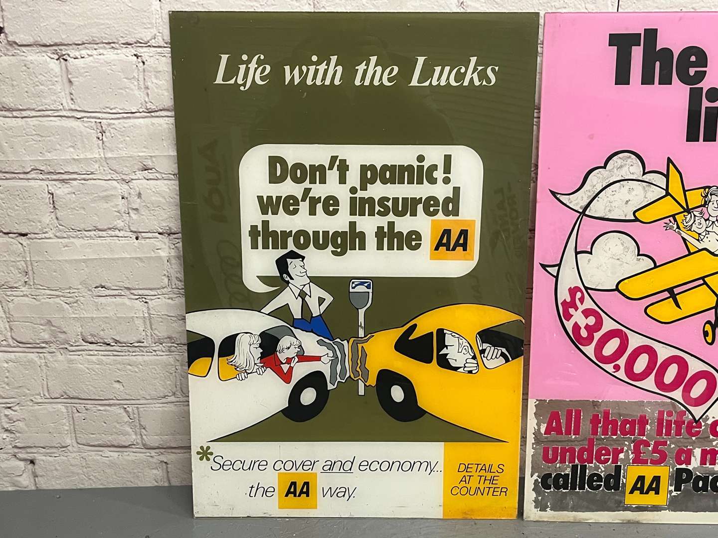 <p>Two Perspex AA Signs</p>