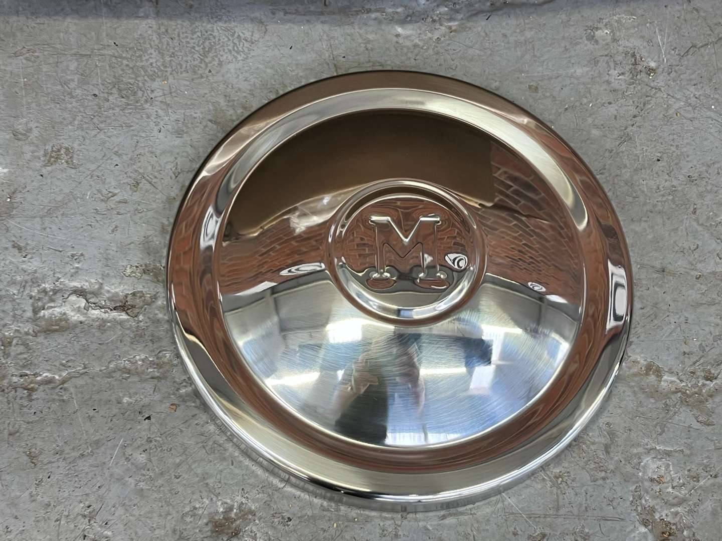 <p>Set of Four Boxed Morris Minor Wheels and Chrome Trims&nbsp;</p>