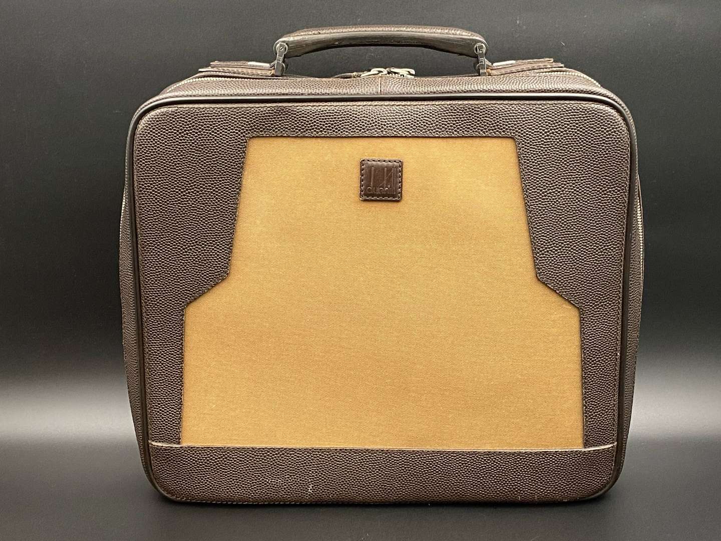 <p>DUNHILL, stitched brown leather and canvas business bag,&nbsp;</p>