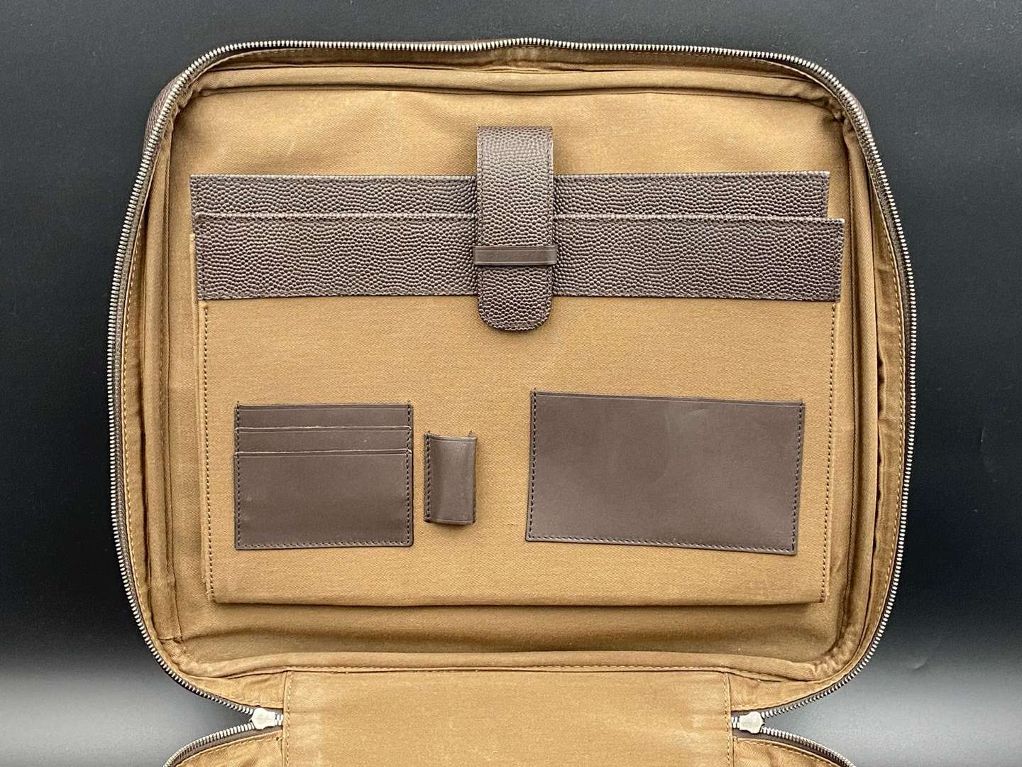 <p>DUNHILL, stitched brown leather and canvas business bag,&nbsp;</p>