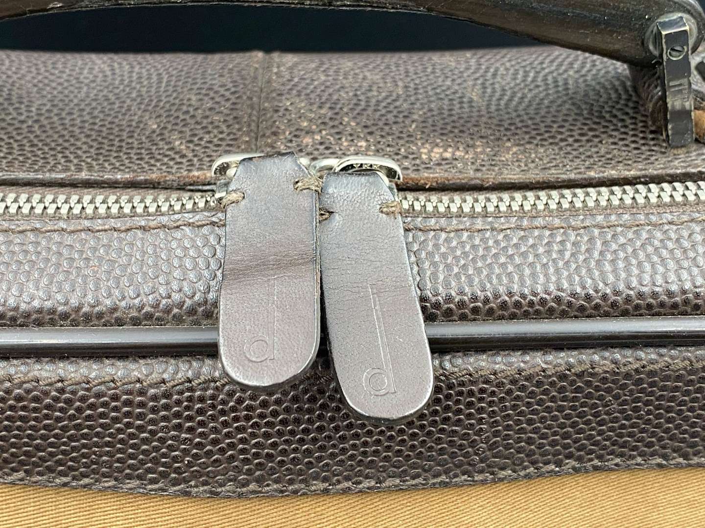 <p>DUNHILL, stitched brown leather and canvas business bag,&nbsp;</p>