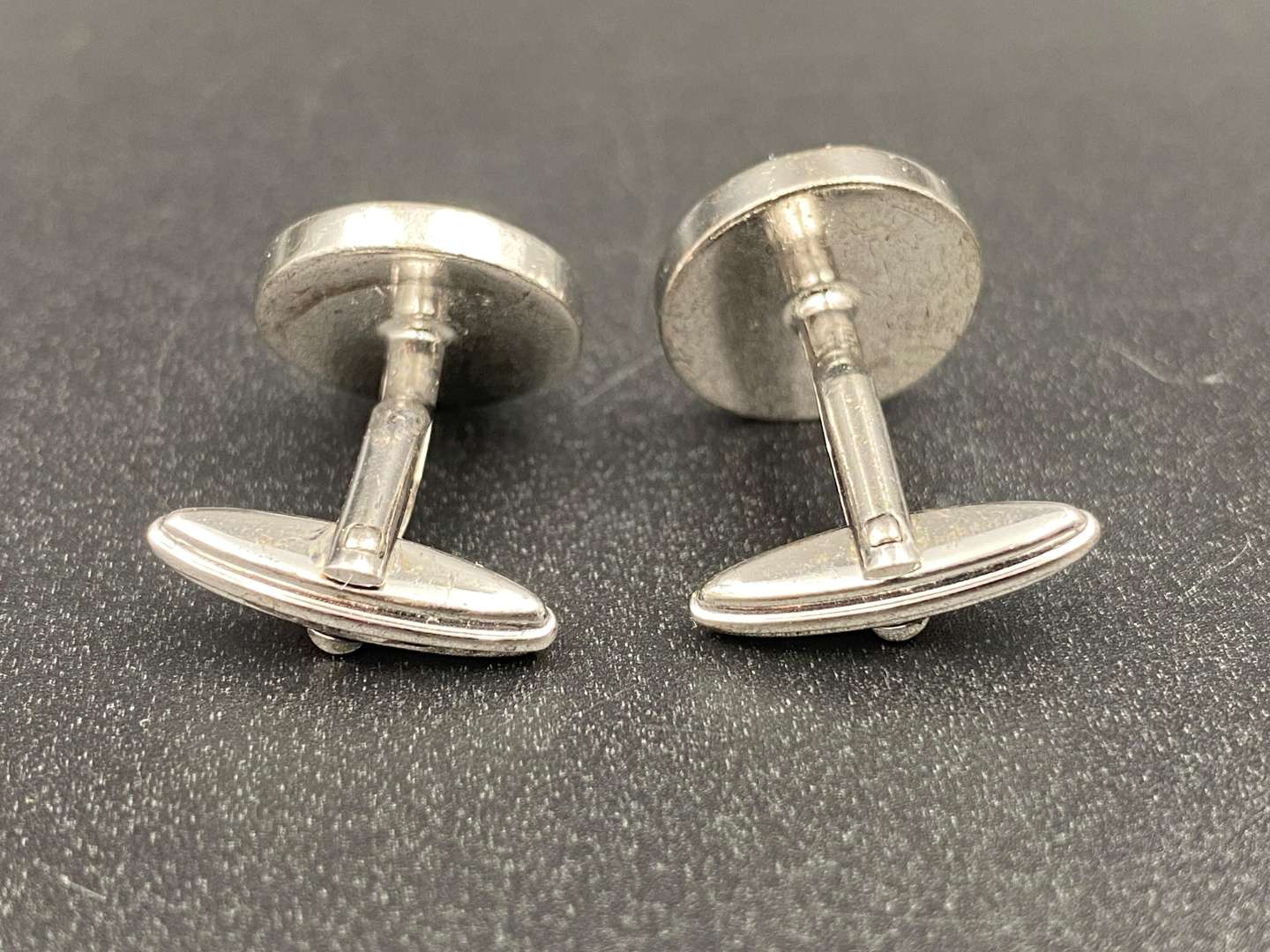 <p>DUNHILL, A pair of signed Button cufflinks,</p>