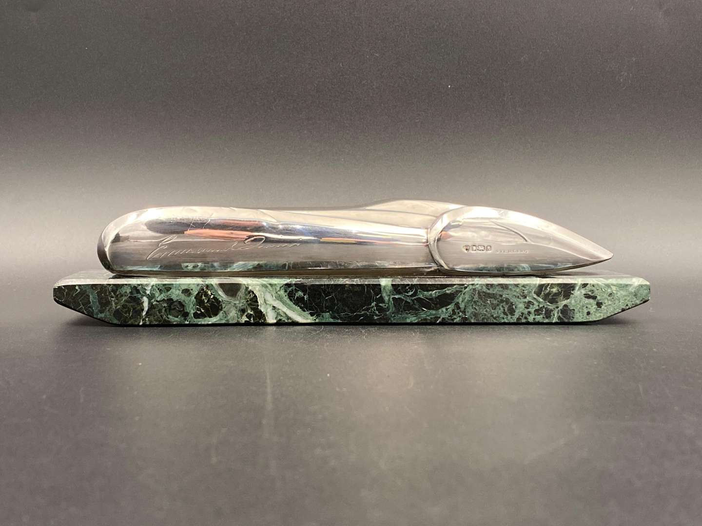 <p>"FIRST PLACE, PEBBLE BEACH CONCOURS d ELEGANCE, AUGUST 18. 1991", silver and marble trophy,&nbsp;</p>