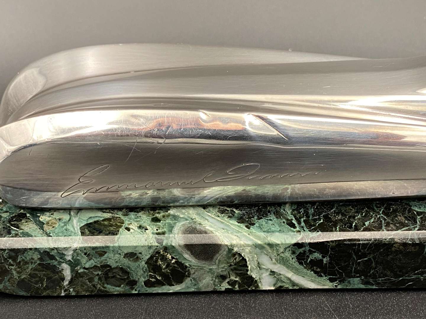 <p>"FIRST PLACE, PEBBLE BEACH CONCOURS d ELEGANCE, AUGUST 18. 1991", silver and marble trophy,&nbsp;</p>