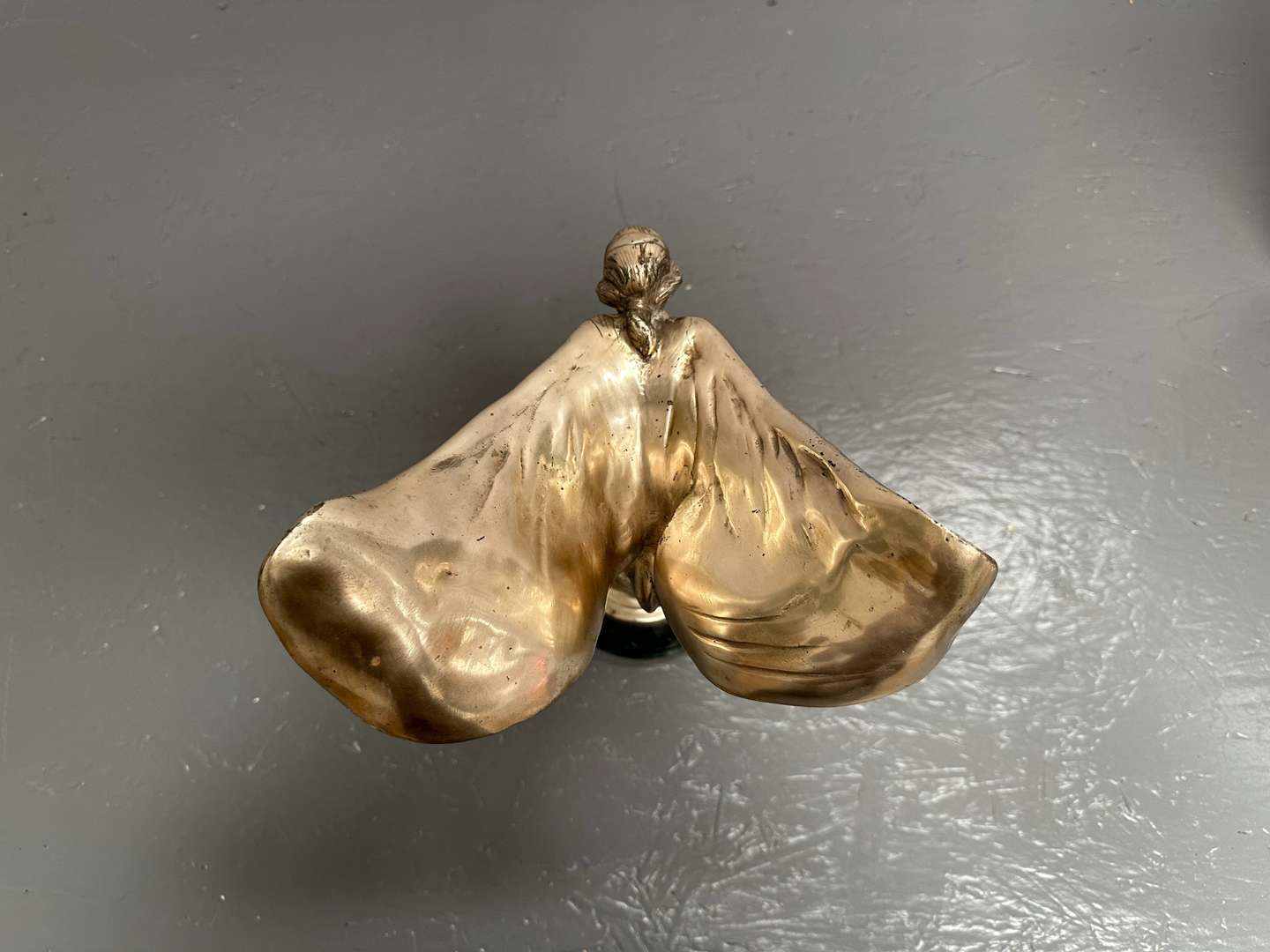 <p>&nbsp;“Spirit of Ecstasy” a late 20th century silvered cast metal desk mascot,</p>