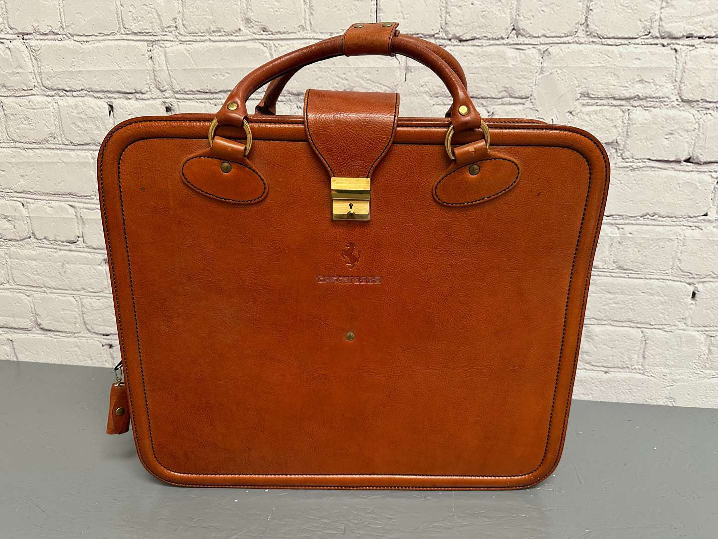 <p>FERRARI, “Testarossa” 1980's stitched leather suitcase,</p>