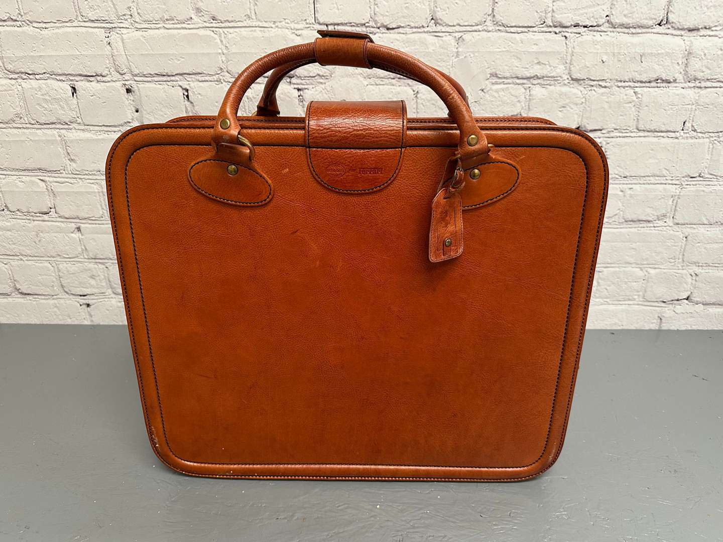 <p>FERRARI, “Testarossa” 1980's stitched leather suitcase,</p>