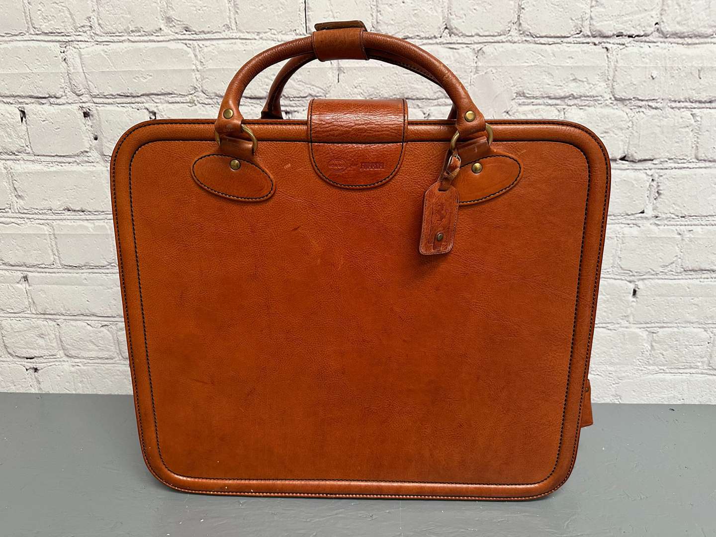 <p>FERRARI, “Testarossa” 1980's stitched leather suitcase,</p>