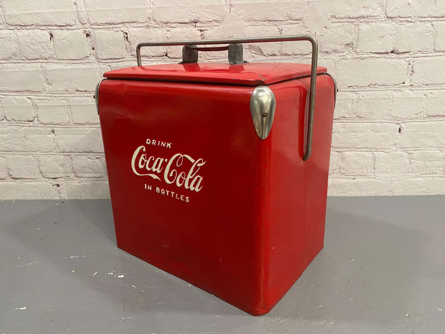 <p>COCA-COLA, A mid 20th century pressed steel cool box.</p>