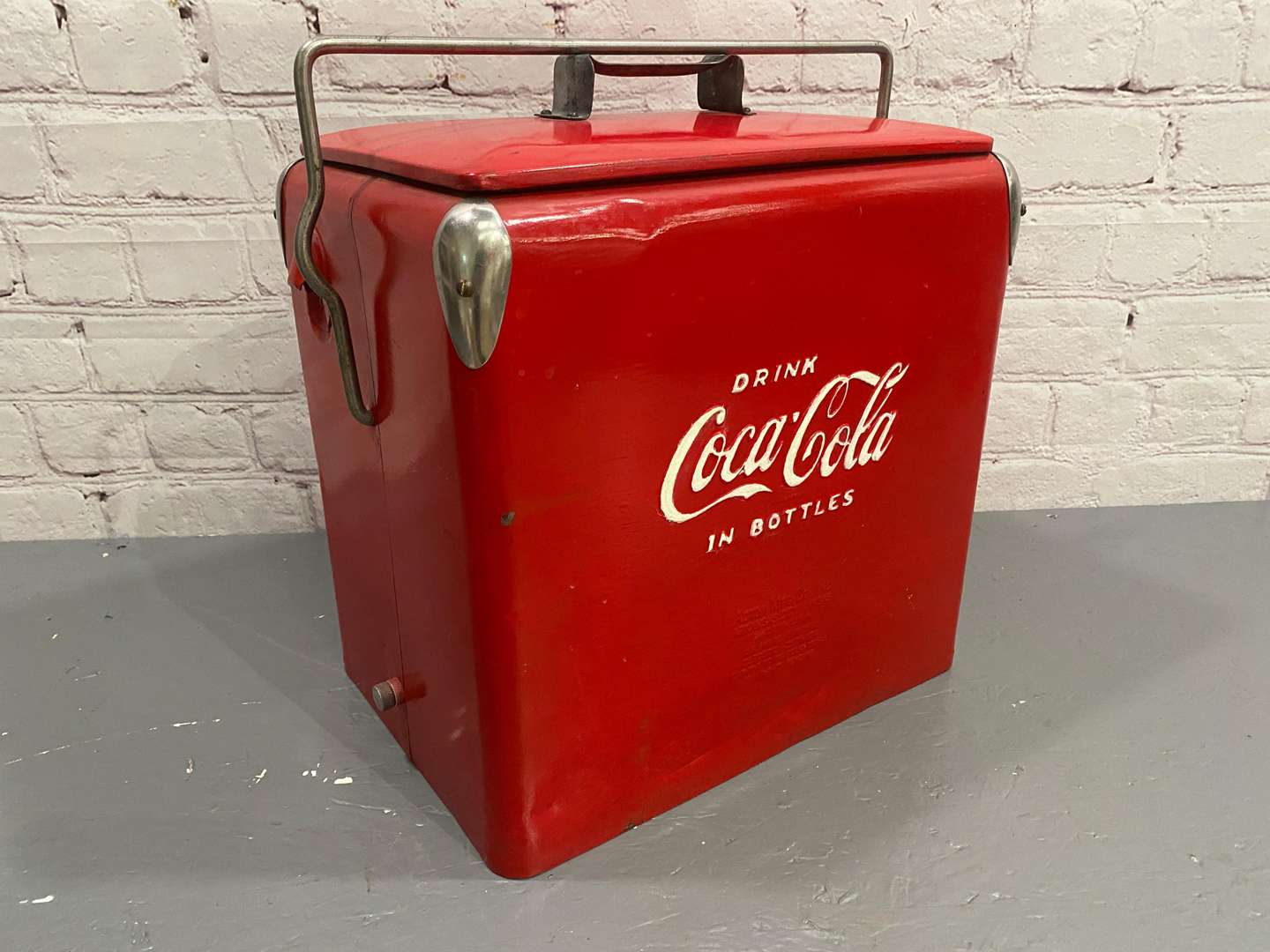 <p>COCA-COLA, A mid 20th century pressed steel cool box.</p>