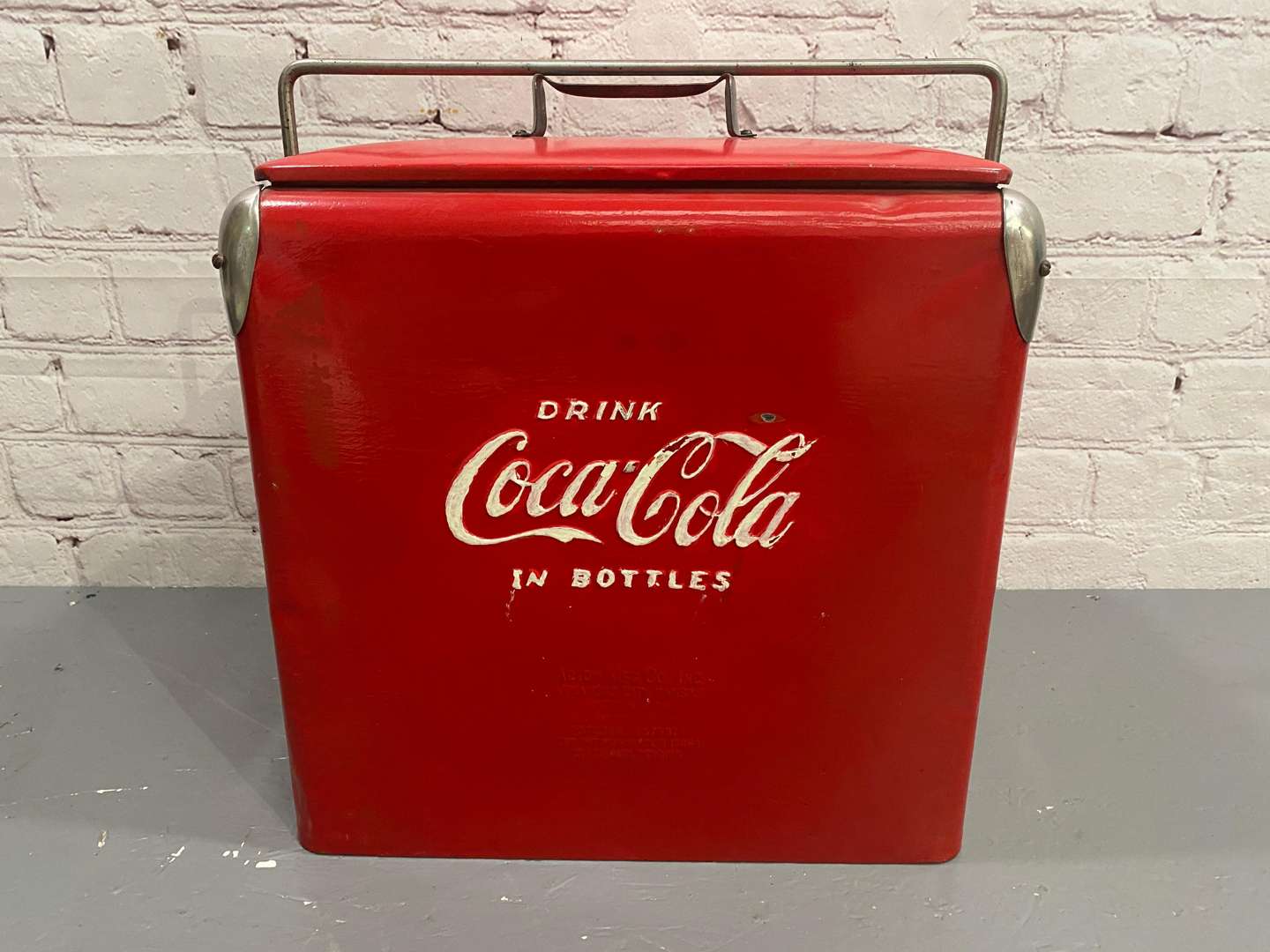 <p>COCA-COLA, A mid 20th century pressed steel cool box.</p>