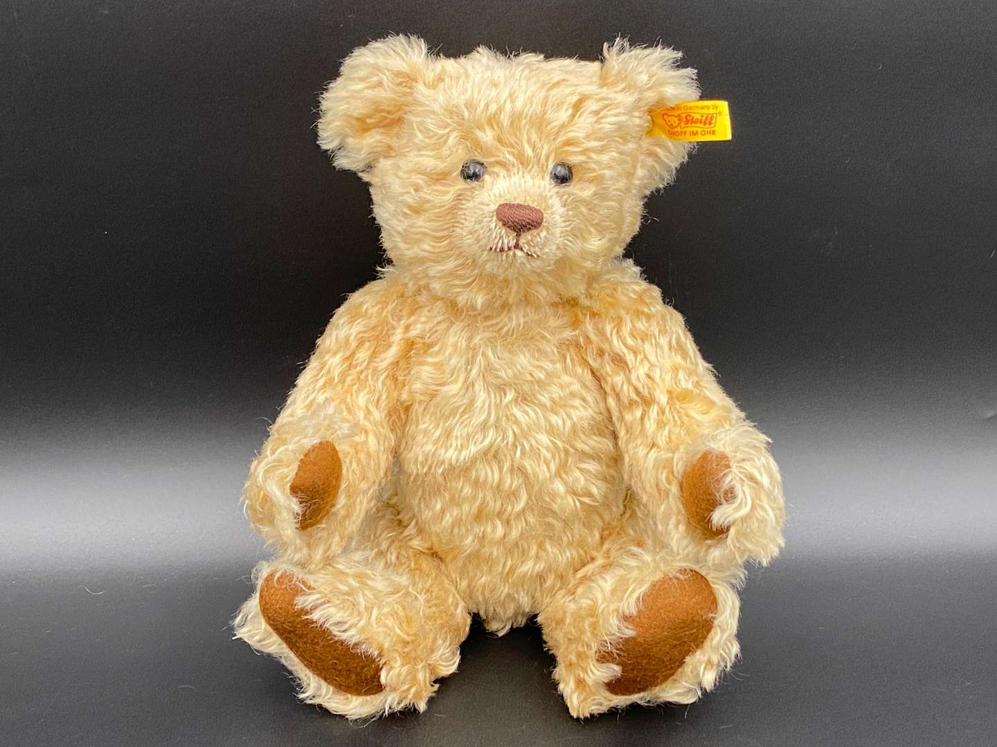 <p>STEIFF, a blonde, jointed mohair teddy bear, 660344</p>