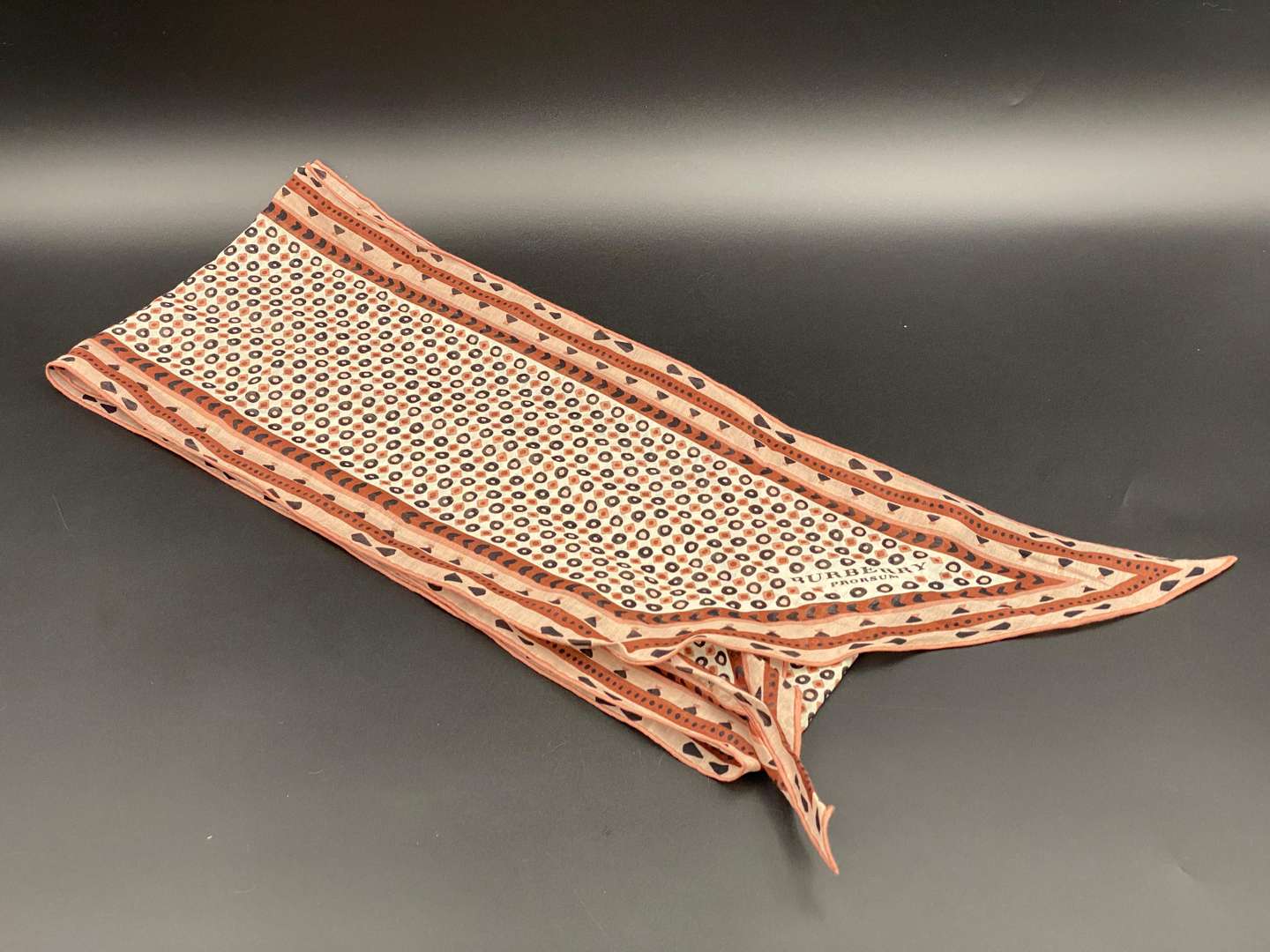 <p>BURBERRY, three various slim, neck scarves</p>