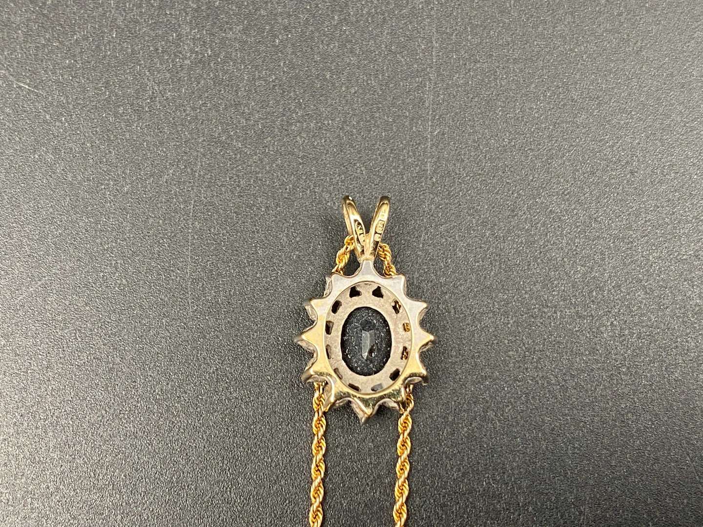 <p>9ct sapphire and gem set pendent & rope twist chain,&nbsp;</p>