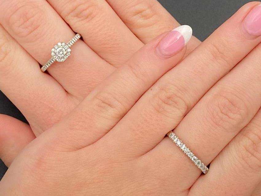 <p>GOLDSMITHS, a diamond set and 18ct white gold ring and another,</p>