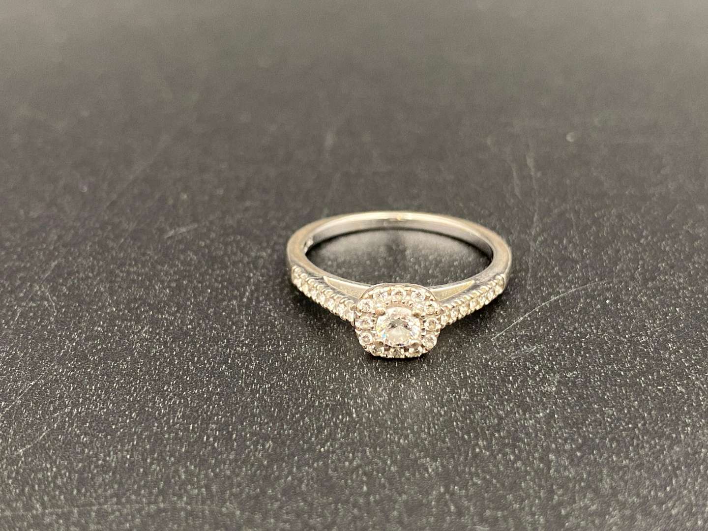 <p>GOLDSMITHS, a diamond set and 18ct white gold ring and another,</p>