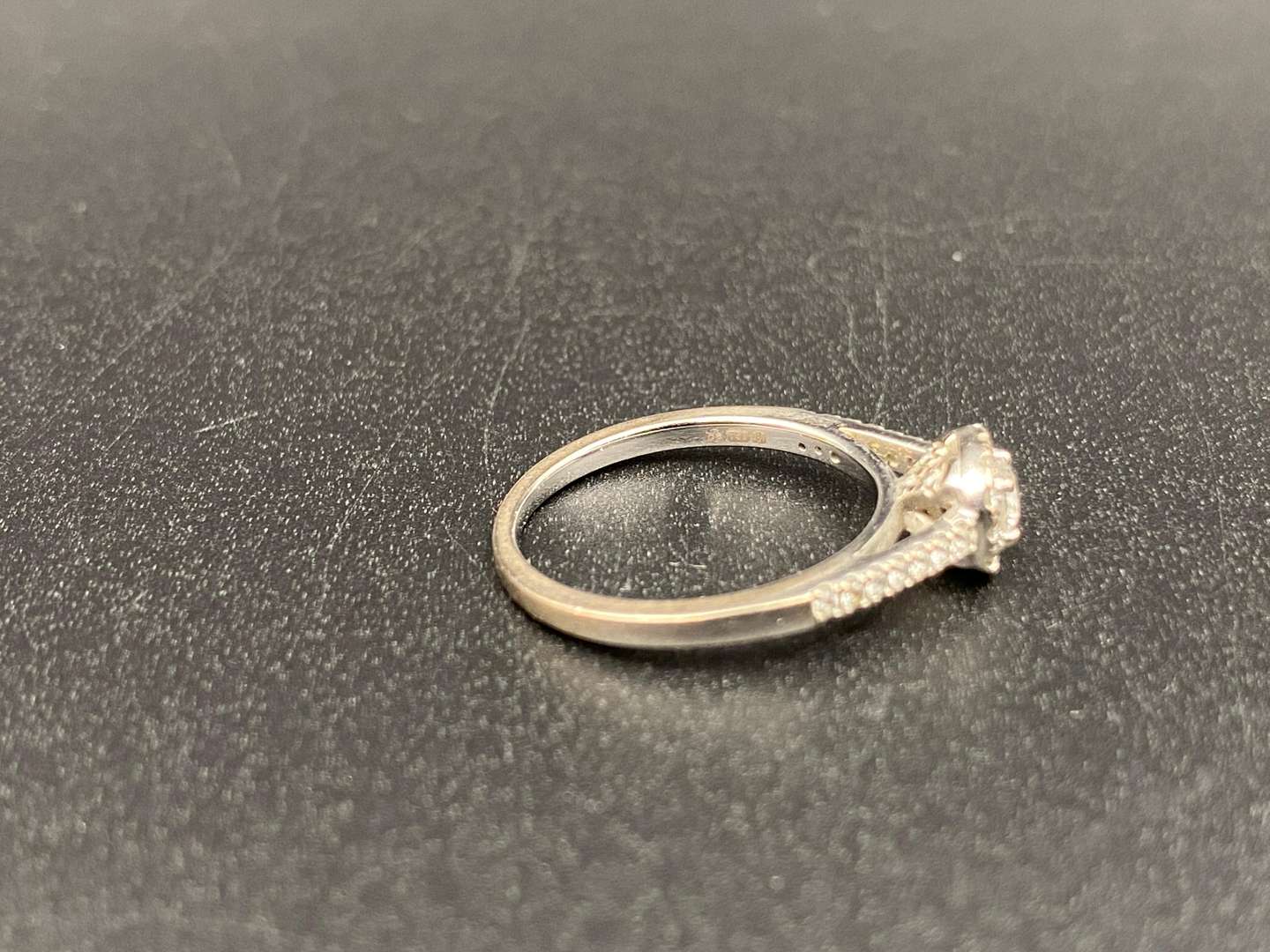 <p>GOLDSMITHS, a diamond set and 18ct white gold ring and another,</p>