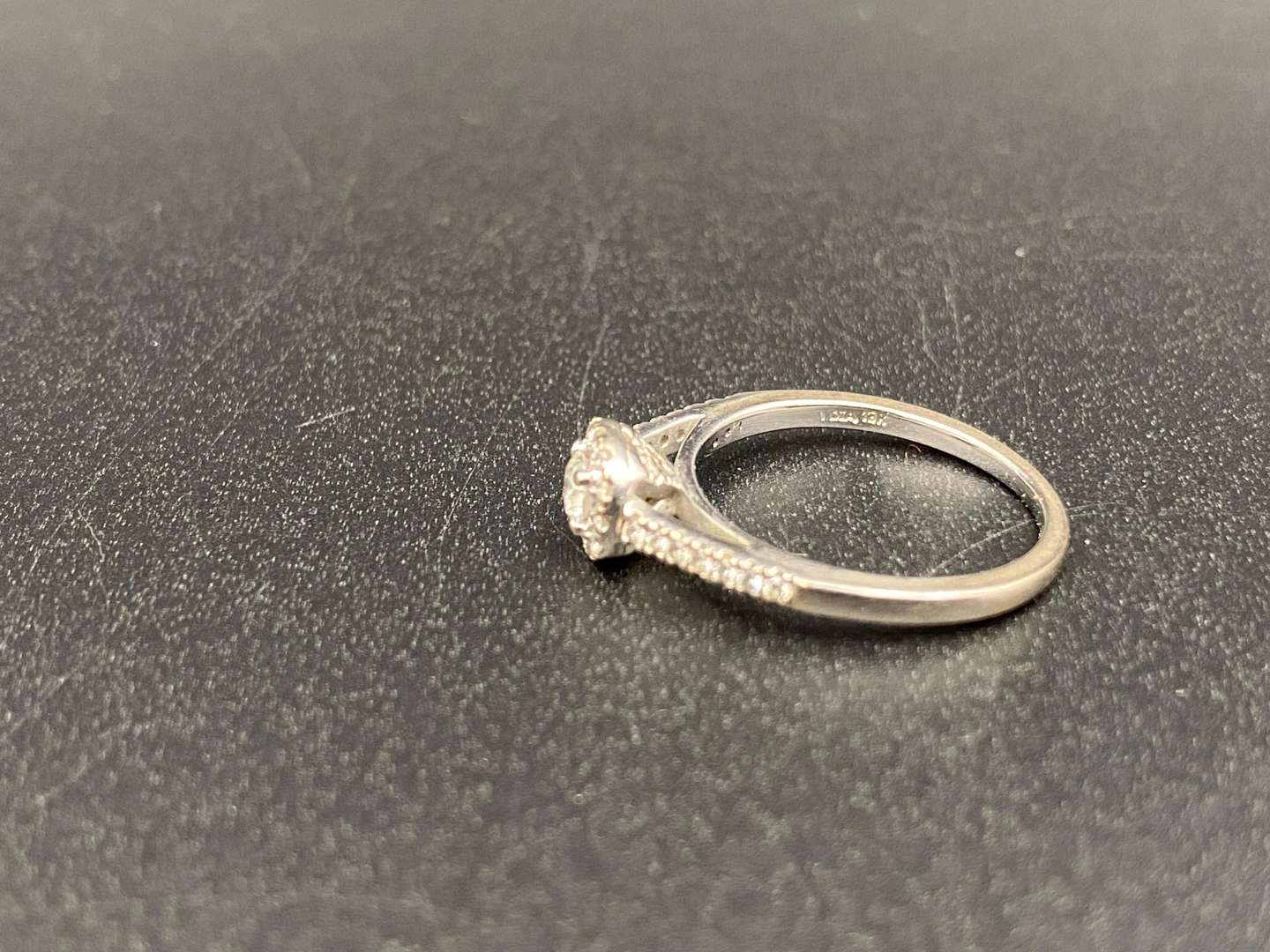 <p>GOLDSMITHS, a diamond set and 18ct white gold ring and another,</p>