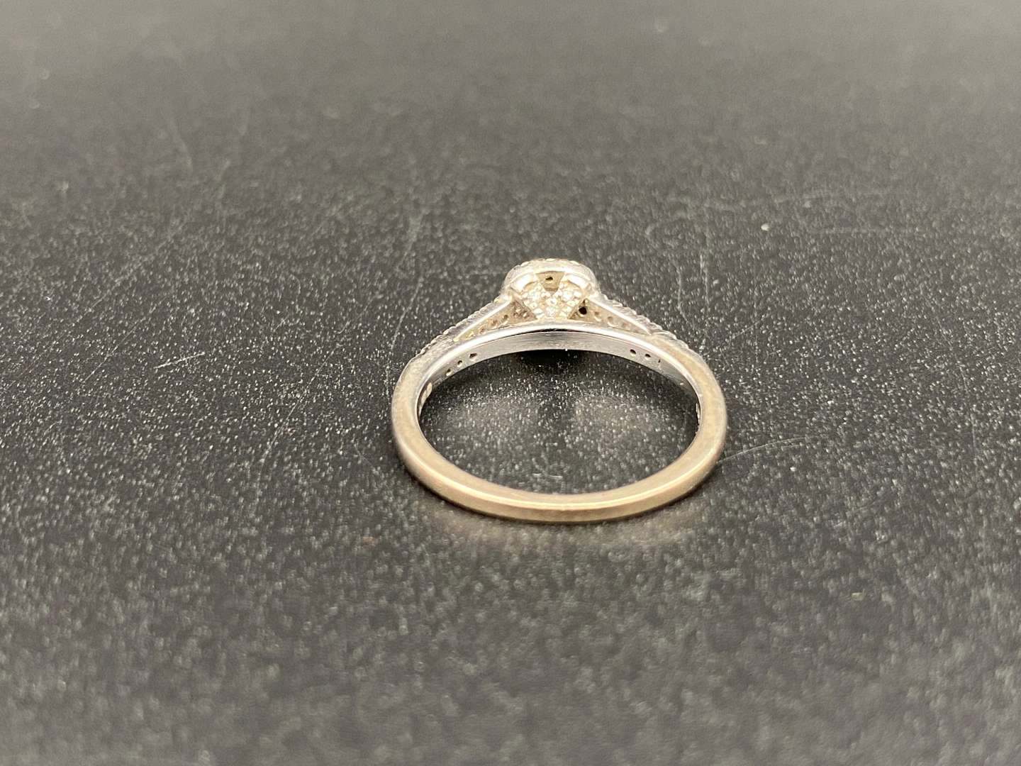 <p>GOLDSMITHS, a diamond set and 18ct white gold ring and another,</p>