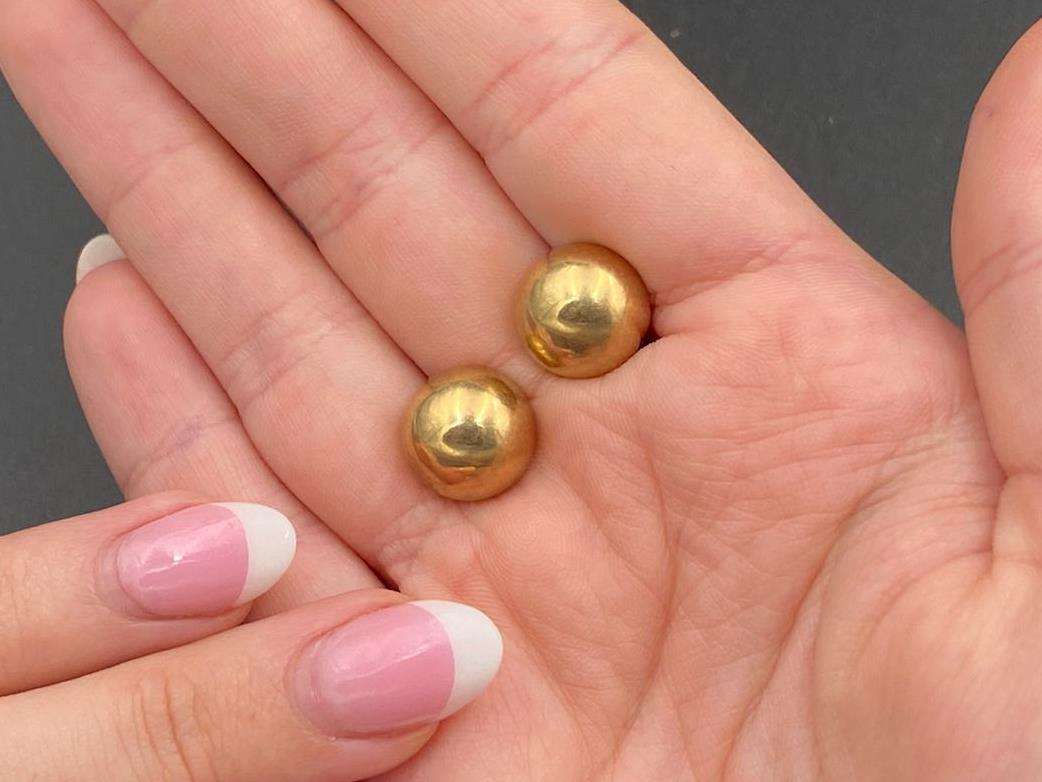 <p>Pair of unmarked, ½ round ear studs</p>