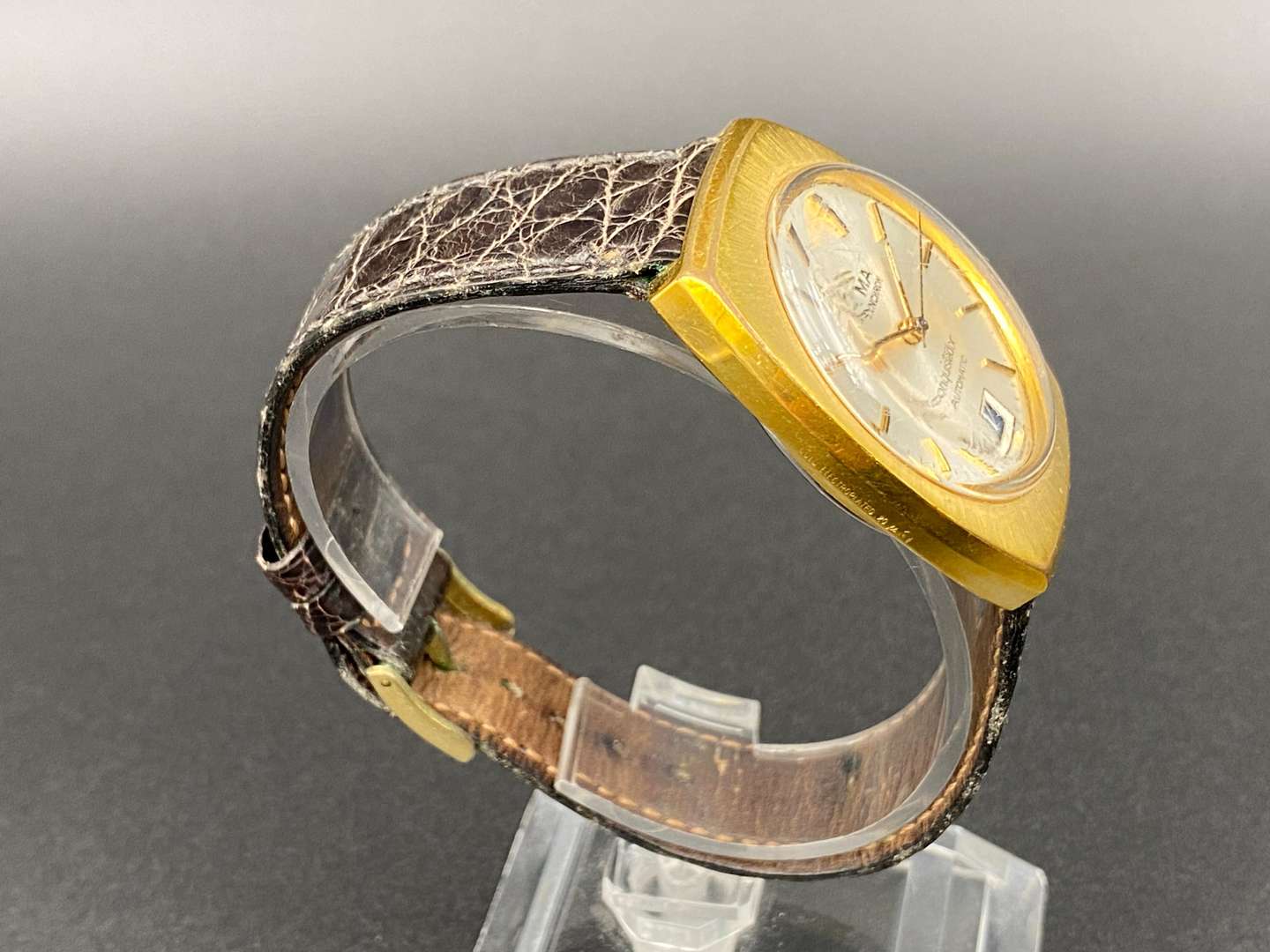 <p>CYMA by SYNCHRON, “Conquistador” a gold plated, automatic wristwatch, 58.001.44, 602611</p>