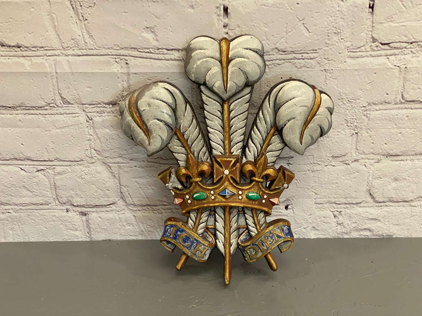 <p>ROYAL WARRANT, 20th century cast aluminium and painted warrant of the former Prince of Wales,</p>
