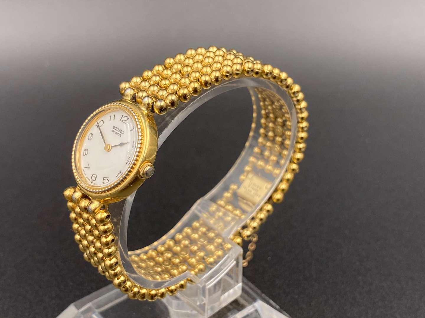 <p>SEIKO, gold plated quartz wristwatch, 7N1554</p>