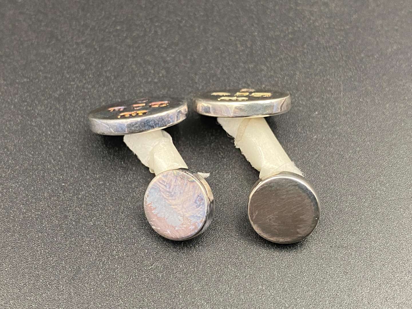 <p>Roberts & Doré, a cased pair of hallmarked silver cuff links,</p>
