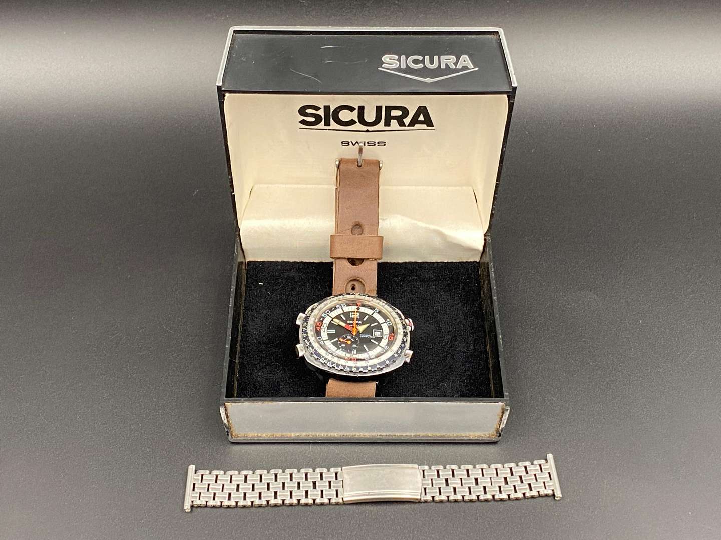 <p>SICURA, Chrono Computer, stainless steel chronograph wristwatch,</p>