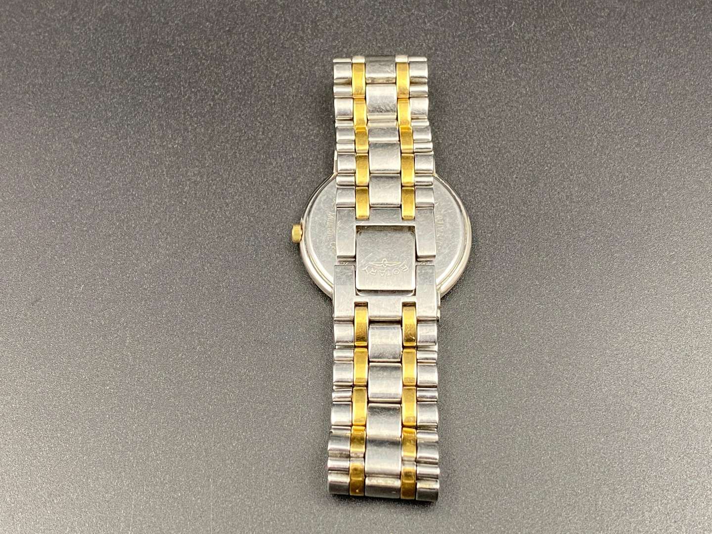 <p>ROTARY, steel & gold plated, quartz, calendar wristwatch, UCAR311, Ref 5021</p>