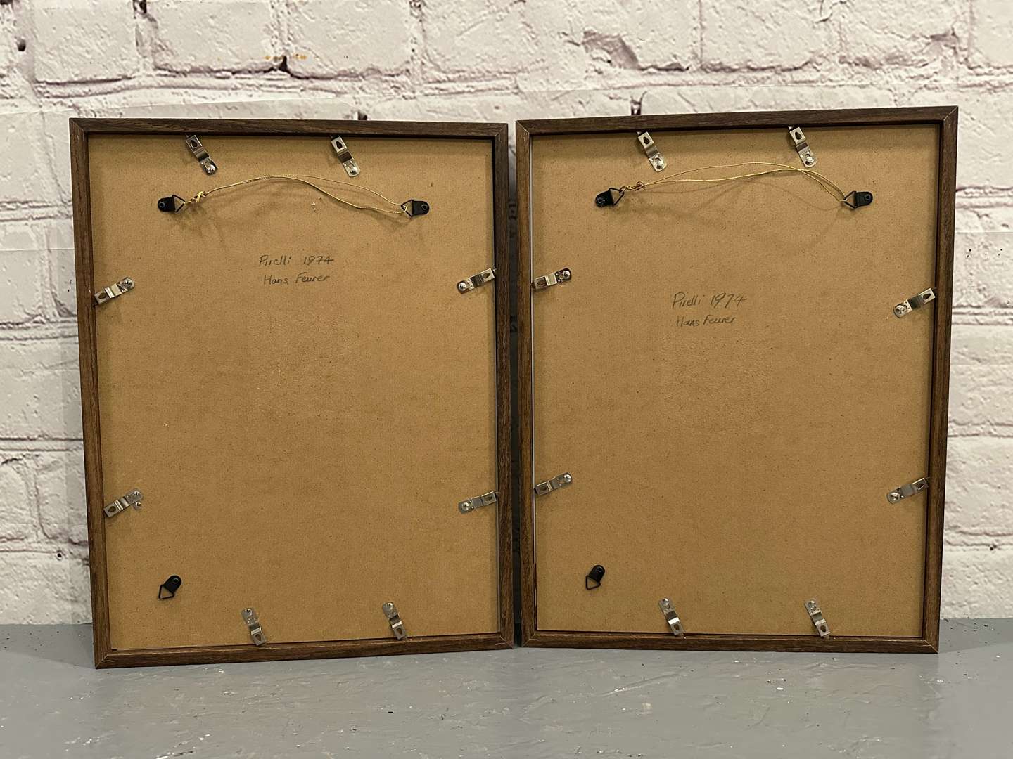 <p>PIRELLI, 2 calendar framed&nbsp;prints, 1974 Hans Feurer</p>