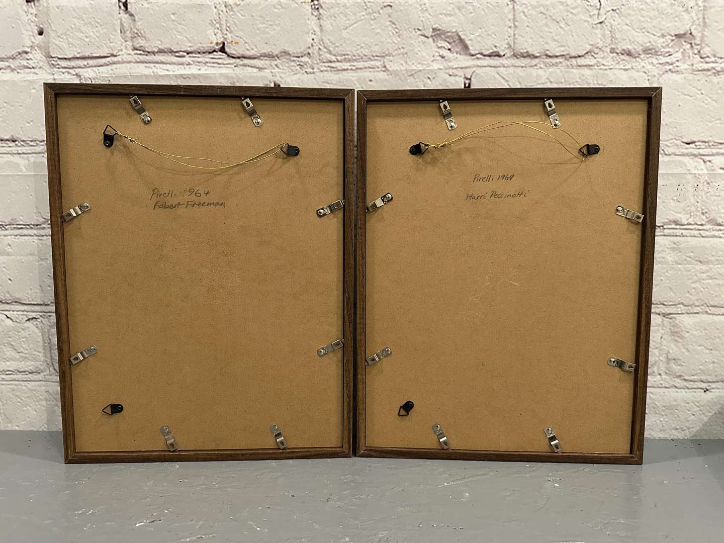 <p>PIRELLI, 2 framed calendar prints, 1969 Harri Peccinotti, 1964 Robert Freeman</p>