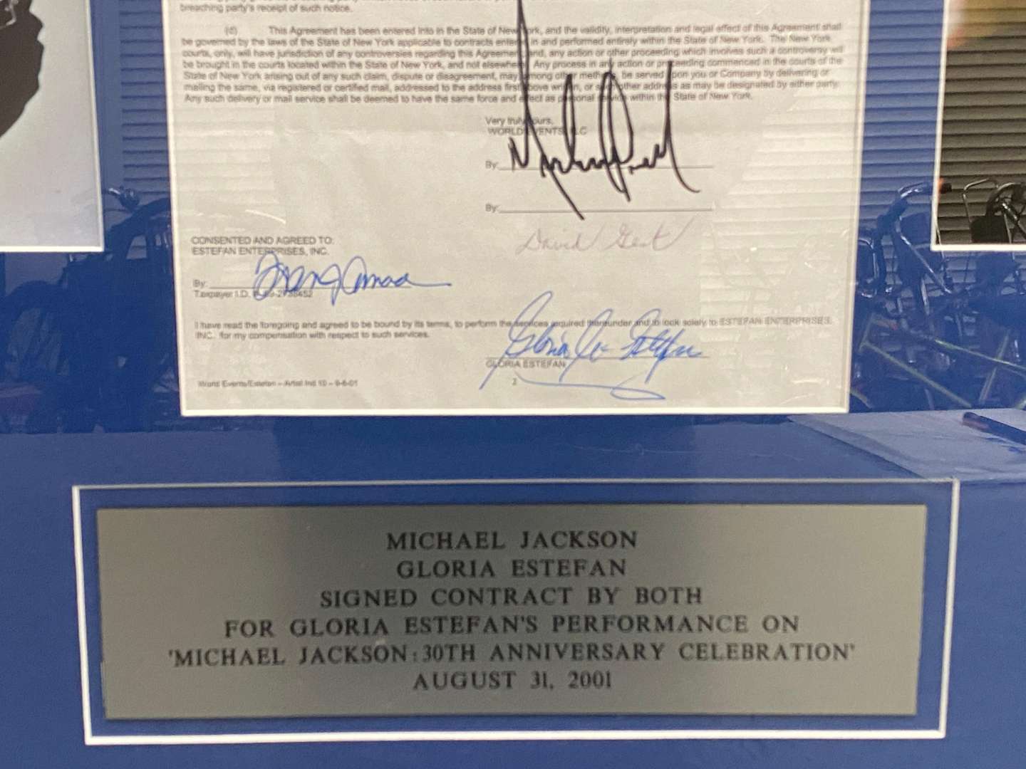 <p>Michael Jackson & Gloria Estefan, signed contract, framed with photographs “All Proceeds to Charity”</p>