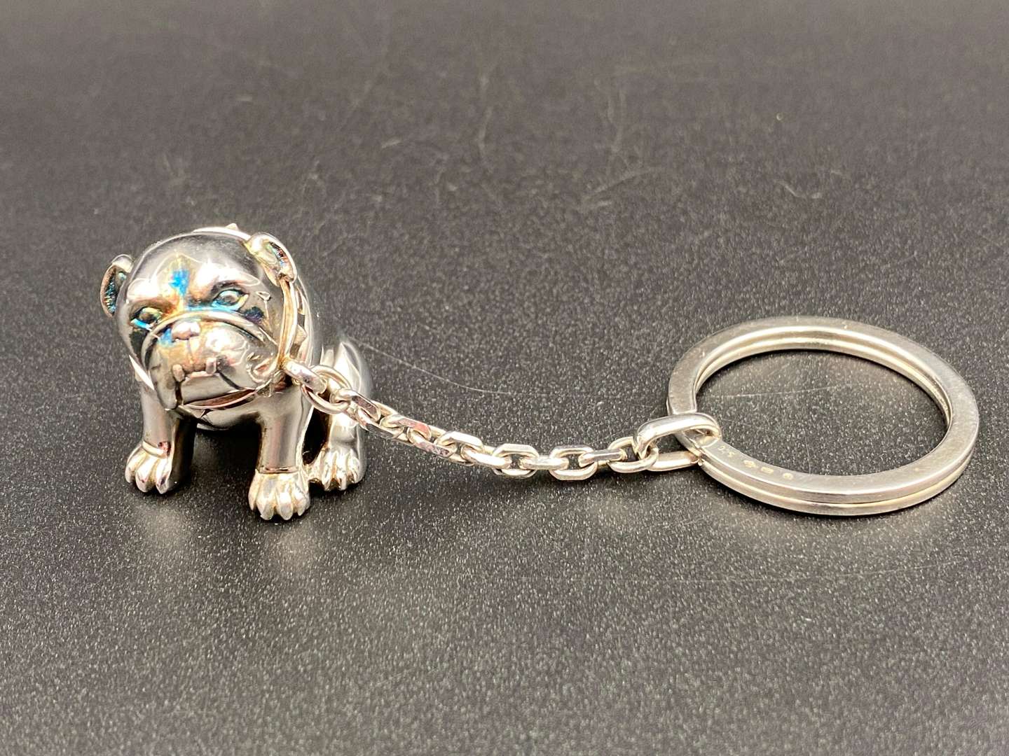 <p>DUNHILL, a Continental silver “Bulldog” key chain and fob,</p>