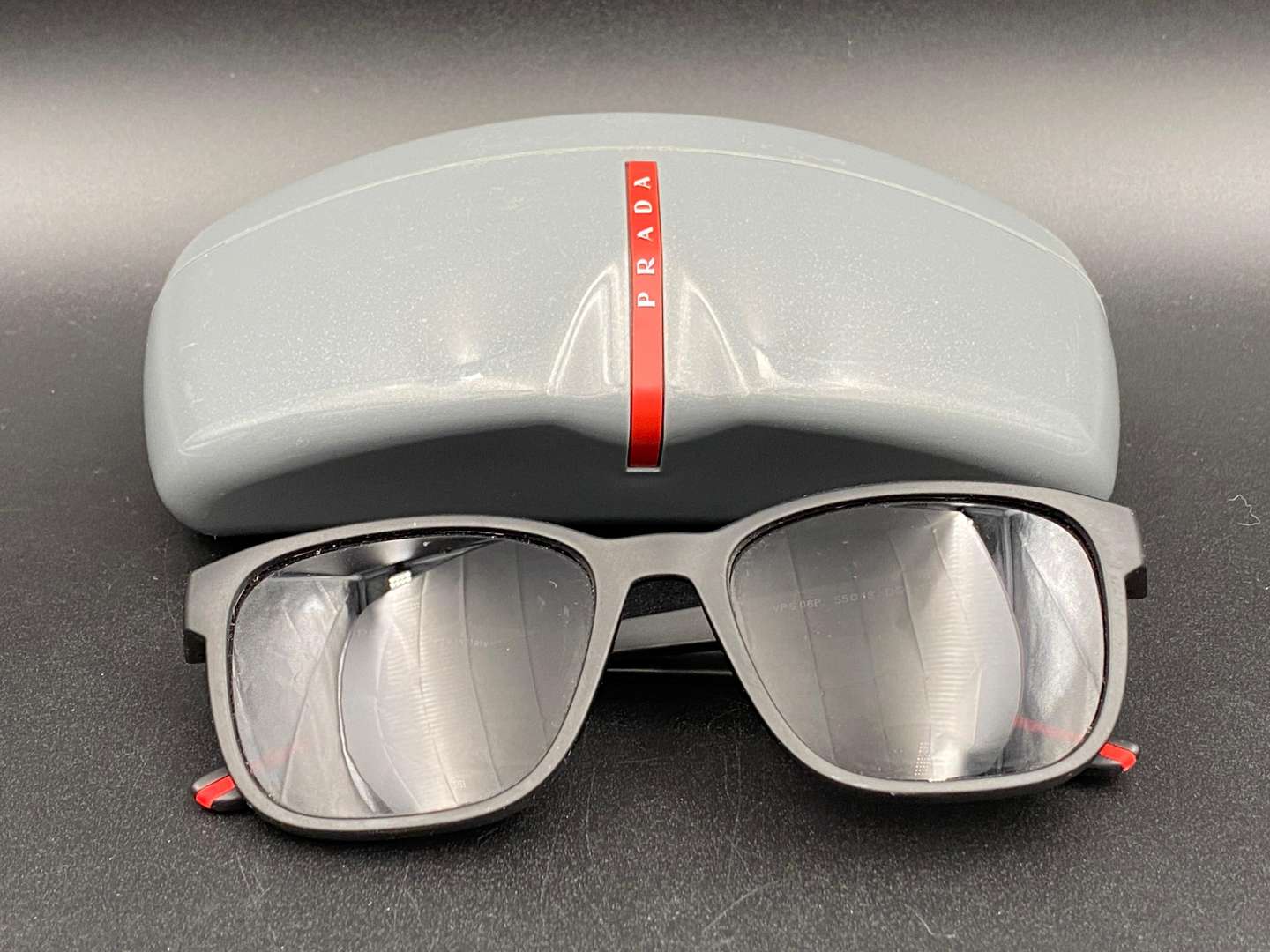 <p>PRADA, Italian branded, black framed sunglasses, VPS06P, 55/18, DGO-101, 145,</p>